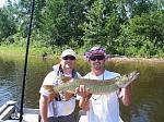 Rita's son Adam with his first muskie on a Double Cowgirl, 4th of July 2010.